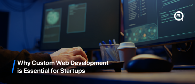 Developer working on dual monitors with custom code, representing the importance of custom web development for startups."