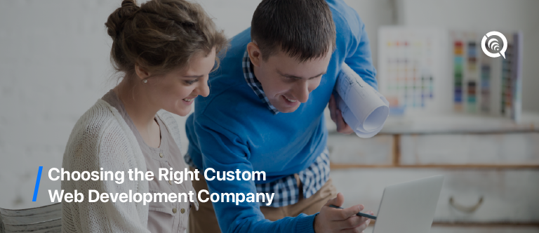 Business owner reviewing custom web development proposals - “Choosing the right custom web development company